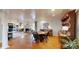 A living room has hardwood floors, a fireplace, and ample seating at 13031 Westmoreland Farm Rd, Davidson, NC 28036