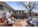 Brick patio with comfortable lounge seating. The space leads to a backyard and outdoor entertainment area at 13031 Westmoreland Farm Rd, Davidson, NC 28036