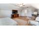 Bright bedroom with TV, built-in shelving, and a desk at 13328 Caite Ridge Rd, Davidson, NC 28036