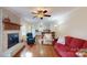 Living room with hardwood floors and view of kitchen at 14122 Honeysuckle Ridge Dr, Matthews, NC 28105