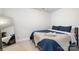 Spacious bedroom with full-size bed and a large mirror at 1428 Winding Stream Rd, Charlotte, NC 28206