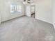 Spacious bedroom with carpet flooring and neutral walls at 17015 Greenlawn Hills Ct, Charlotte, NC 28213