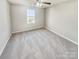 Spacious carpeted bedroom with neutral walls and ample natural light at 17015 Greenlawn Hills Ct, Charlotte, NC 28213