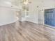 Bright living room with vaulted ceilings and laminate flooring at 17015 Greenlawn Hills Ct, Charlotte, NC 28213