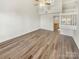 Open living area with loft and hardwood flooring at 17015 Greenlawn Hills Ct, Charlotte, NC 28213
