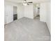 Large main bedroom featuring plush carpeting and an ensuite bath at 17015 Greenlawn Hills Ct, Charlotte, NC 28213