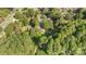 Aerial view showcasing home's wooded surroundings at 1935 Berkshire Dr, Gastonia, NC 28052