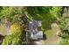 Aerial view of house, backyard, and surrounding trees at 1935 Berkshire Dr, Gastonia, NC 28052