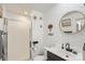Stylish bathroom with a patterned wall, vanity with granite countertop, and a shower at 1935 Berkshire Dr, Gastonia, NC 28052