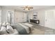 Comfortable bedroom with a queen-size bed and neutral color palette at 1935 Berkshire Dr, Gastonia, NC 28052