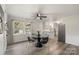 Spacious dining area with glass-top table, chairs, and view into kitchen at 1935 Berkshire Dr, Gastonia, NC 28052
