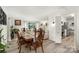 Formal dining room with wood table and six chairs at 1935 Berkshire Dr, Gastonia, NC 28052