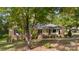 Brick ranch home with mature landscaping and walkway at 1935 Berkshire Dr, Gastonia, NC 28052