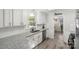 Updated kitchen featuring white cabinets, granite countertops, and stainless steel appliances at 1935 Berkshire Dr, Gastonia, NC 28052