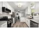 Modern kitchen with white cabinets and granite counters at 1935 Berkshire Dr, Gastonia, NC 28052