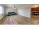 Light-filled living room features hardwood floors and a view into the dining area at 2102 Eden Ter, Rock Hill, SC 29730