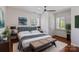 Spacious bedroom with hardwood floors and neutral decor at 2408 Pinckney Ave, Charlotte, NC 28205