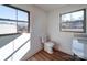 Bright bathroom with wood floors and dual windows at 2705 Lowell Bethesda Rd, Gastonia, NC 28056