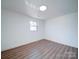 Spacious bedroom featuring wood floors and a window at 2705 Lowell Bethesda Rd, Gastonia, NC 28056