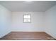 Simple bedroom with wood floors and a window at 2705 Lowell Bethesda Rd, Gastonia, NC 28056