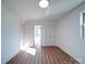 Bright bedroom with hardwood floors and neutral walls at 2705 Lowell Bethesda Rd, Gastonia, NC 28056