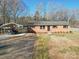 Brick ranch house with carport and landscaping at 2705 Lowell Bethesda Rd, Gastonia, NC 28056