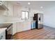 Modern kitchen with stainless steel appliances and white cabinets at 2705 Lowell Bethesda Rd, Gastonia, NC 28056