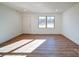Bright living room with hardwood floors and windows at 2705 Lowell Bethesda Rd, Gastonia, NC 28056