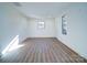 Living room with hardwood floors and window at 2705 Lowell Bethesda Rd, Gastonia, NC 28056