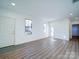 Living room with hardwood floors and access to other rooms at 2705 Lowell Bethesda Rd, Gastonia, NC 28056