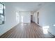 Bright living room features hardwood floors and an open floor plan at 2705 Lowell Bethesda Rd, Gastonia, NC 28056