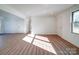 Spacious living room with hardwood floors and natural light at 2705 Lowell Bethesda Rd, Gastonia, NC 28056