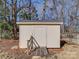 Tan storage shed with wooden walkway at 2705 Lowell Bethesda Rd, Gastonia, NC 28056