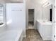 Clean bathroom with double vanity, soaking tub, and separate shower at 3744 Amber Meadows Dr, Charlotte, NC 28269
