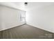 Bright bedroom with gray carpet and window blinds at 3744 Amber Meadows Dr, Charlotte, NC 28269