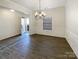 Elegant dining room with chandelier and wainscoting at 3744 Amber Meadows Dr, Charlotte, NC 28269