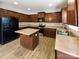 Modern kitchen with an island and stainless steel appliances at 3744 Amber Meadows Dr, Charlotte, NC 28269