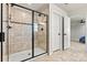 Modern shower with tiled walls and built-in seat at 6270 Durango Way, Denver, NC 28037