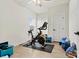 Small bedroom with exercise bike and door at 6270 Durango Way, Denver, NC 28037