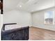 Bright bedroom with a twin bed and window at 6270 Durango Way, Denver, NC 28037
