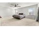 Well-lit bedroom with carpet and ceiling fan at 6270 Durango Way, Denver, NC 28037