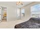 Bedroom with window, ceiling fan, and carpet at 6270 Durango Way, Denver, NC 28037