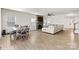 Dining area with hardwood floors adjacent to living room and kitchen at 6270 Durango Way, Denver, NC 28037