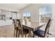 Bright dining room with wooden table and chairs near sliding doors at 6270 Durango Way, Denver, NC 28037