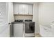Laundry room with washer, dryer, and cabinets at 6270 Durango Way, Denver, NC 28037