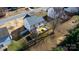 Aerial view of home with fenced yard, patio with gazebo, and mature trees at 712 Georgie St, Troutman, NC 28166