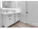 Modern bathroom featuring dual sinks, sleek fixtures, and ample storage at 712 Georgie St, Troutman, NC 28166