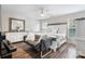 Spacious main bedroom with a seating area, a dresser with mirror, and a relaxing atmosphere at 712 Georgie St, Troutman, NC 28166