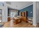 Formal dining area featuring hardwood floors, natural light, and wooden hutch at 10015 Lattice Ct, Charlotte, NC 28269