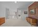 Wide hallway with a brick accent wall, and view of the other rooms in the home at 10015 Lattice Ct, Charlotte, NC 28269